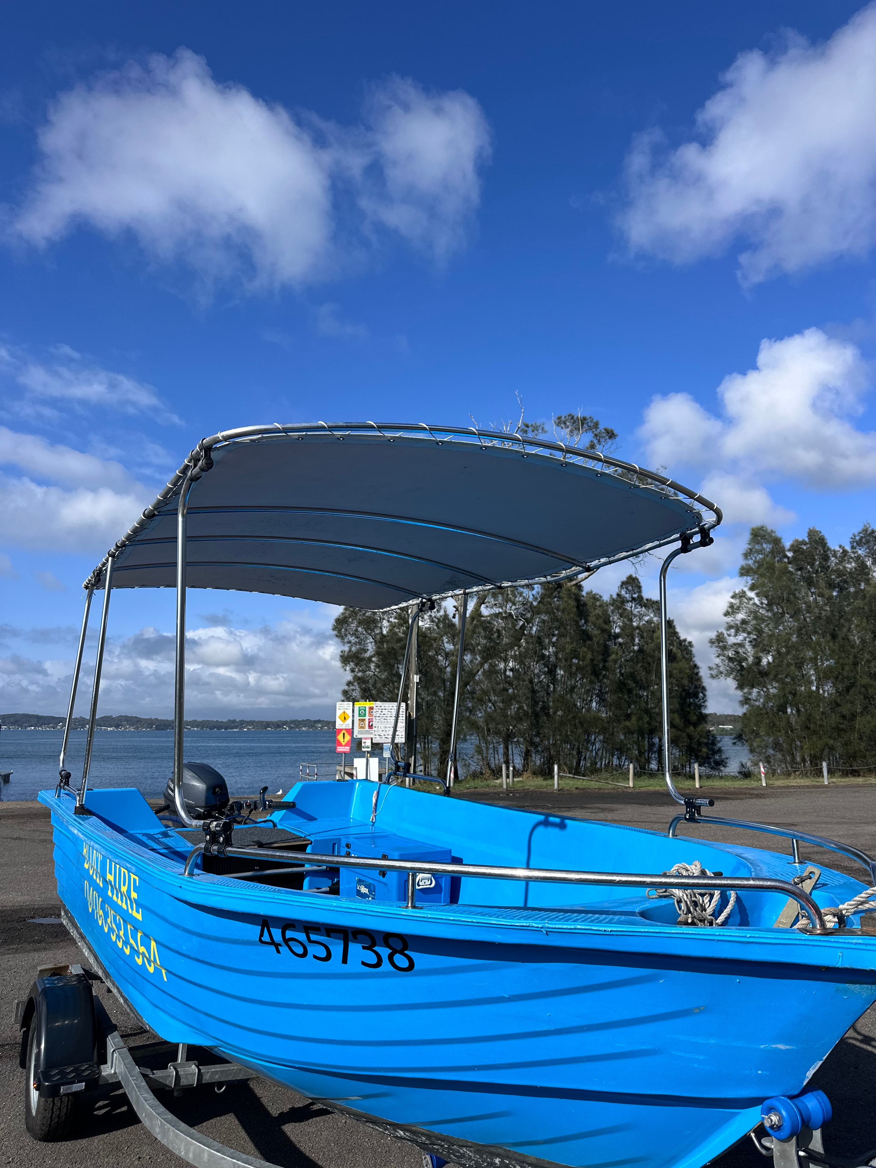 Our blue hire boat showing the canopy and full vessel